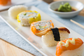 Salmon and caviar rolls served on a plate