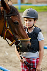 Horse and lovely equestrian girl