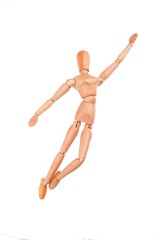 wood model figure jumping to the sky