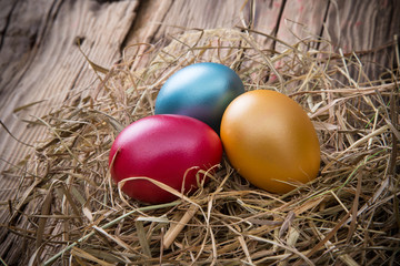 Easter eggs on wooden background