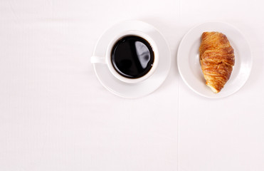 Coffee and croissant for breakfast