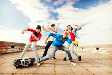 group of teenagers dancing