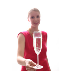 Frau im roten Kleid mit Sektglass