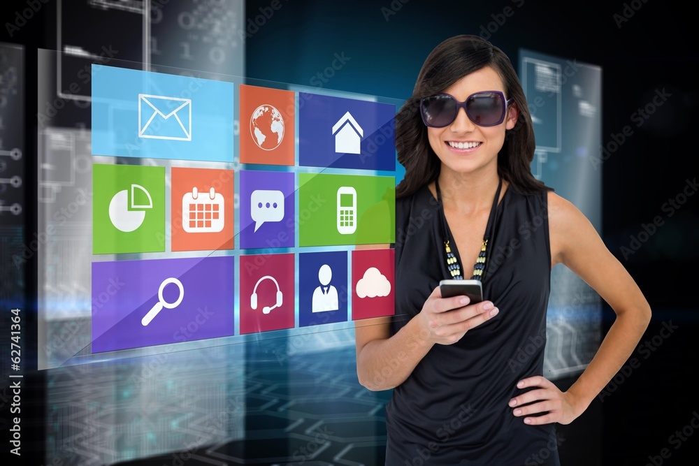 Poster Glamorous brunette using smartphone with app icon menu