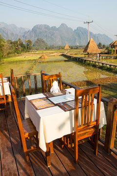 Resort Vang Vieng, Laos, areas of green rice fields