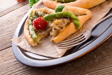 home-baked pide with green asparagi