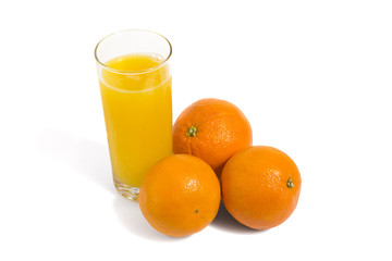 Fresh orange and glass of juice