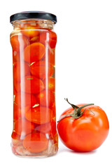 canned tomatoes in glass jars