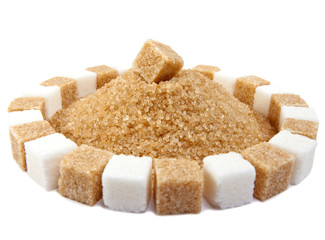 Sugar cube on a heap of granulated sugar