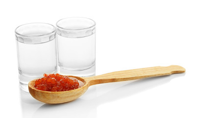 Glasses of vodka, red caviar  isolated on white