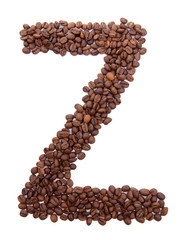 Alphabet from coffee beans isolated on white