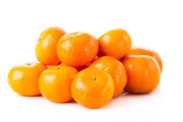 ripe juicy tangerine on a white background.  Clementine Mandarin