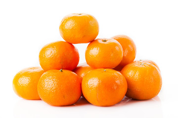 ripe juicy tangerine on a white background.  Clementine Mandarin