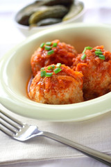 Meatballs with rice and tomato sauce