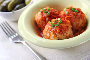 Meatballs with rice and tomato sauce
