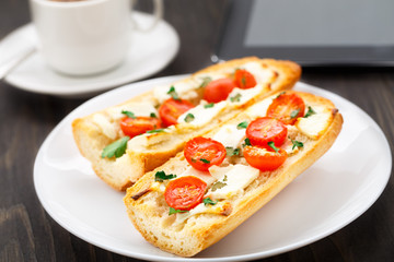 Office breakfast. Vegetarian sandwich and coffee