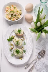 Zelfklevend Fotobehang easter dishes,stuffed eggs and potato salad © Kamila Cyganek