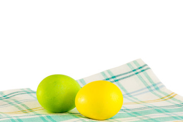 Easter eggs on a checkered napkin on a white background