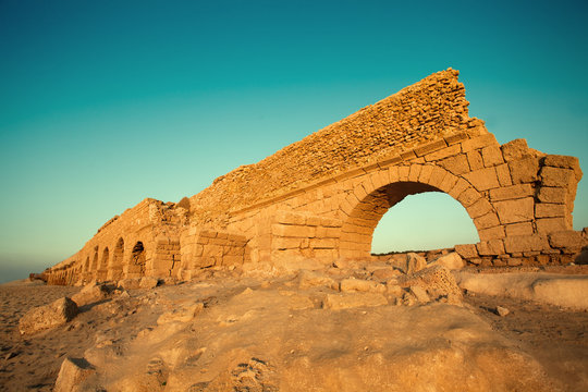 Aqueduct in ancient city Caesarea in Israel
