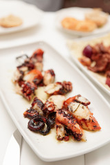 Grilled octopus on plate
