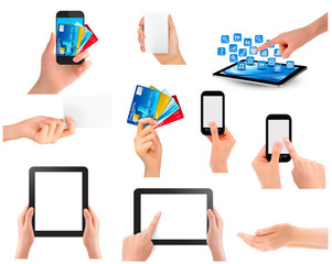 Set of hands holding different business objects. Vector illustra