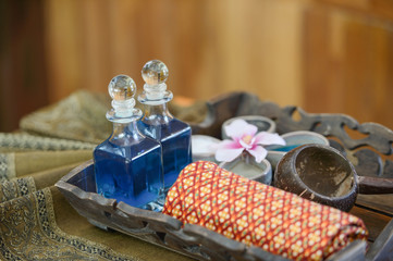 Beautiful spa setting with flower on wooden table