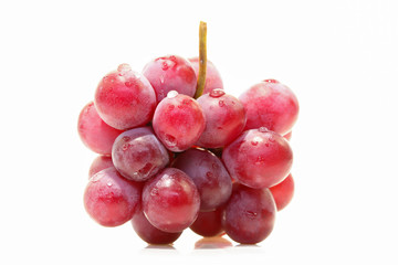 Red grape isolated on white.