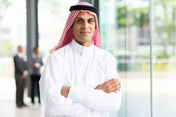 muslim businessman with arms crossed