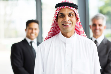 muslim businessman with team on background
