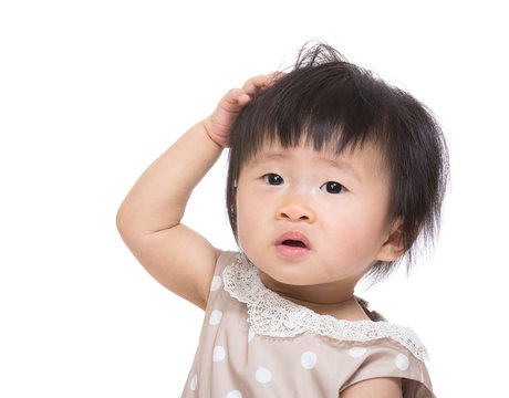 Asian baby girl scratch head