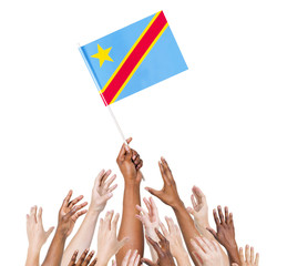 Group Of Multi-Ethnic People Holding The Flag Of Congo