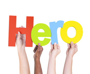 Multi-Ethnic Group Of People Holding The Word Hero