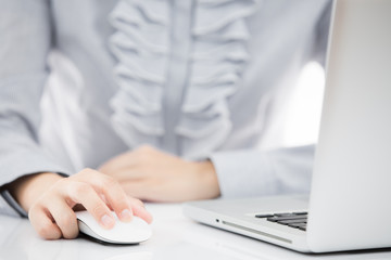 Lady typing on laptop