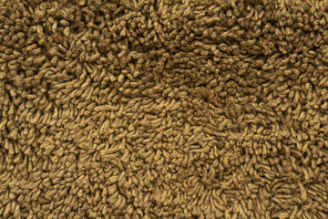 Brown carpet texture close up