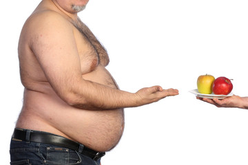 	fat man holding apple 