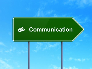 Marketing concept: Communication and Gears on road sign