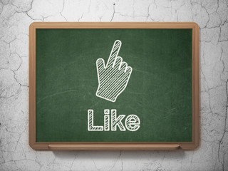 Social network concept: Mouse Cursor and Like on chalkboard