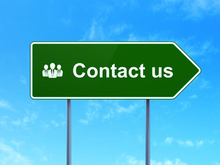 Marketing concept: Contact Us and Business People on road sign