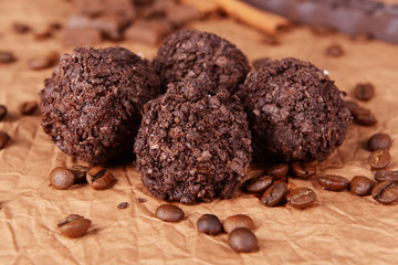 Delicious chocolates on table close-up