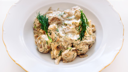 Beef meatballs with fungi porcini cream