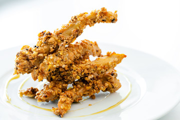 Fried chicken with dried fruits.