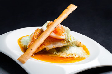 Red mullet with saffron sauce.