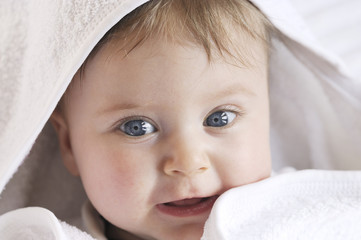 baby portrait with white towel