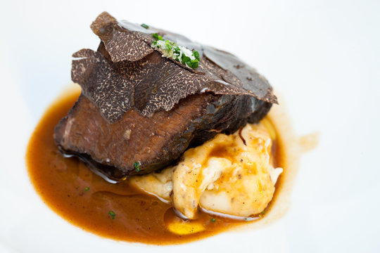 Roasted beef with black truffle and mashed potatoes.