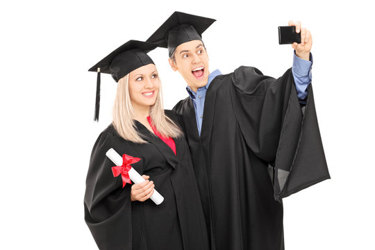 Male and female student taking a selfie
