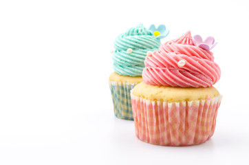 Vanilla cupcakes isolated white background