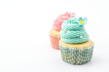 Vanilla cupcakes isolated white background