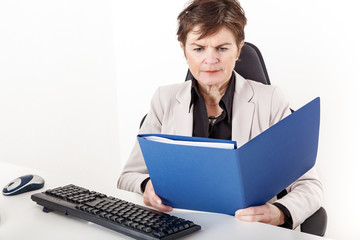 Businesswoman examination of documents