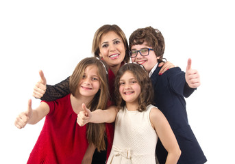 Group shot of a family with thumbs up isolated on white