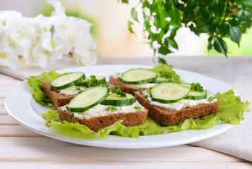 Delicious canapes on table close-up